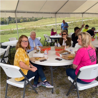 people at table smiling